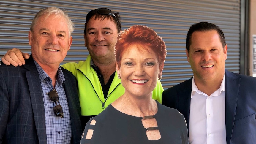 Peter Georgiou (r) campaign with Colin Tinknell (l), Ray Allen (c) and a cardboard cutout of Pauline Hanson