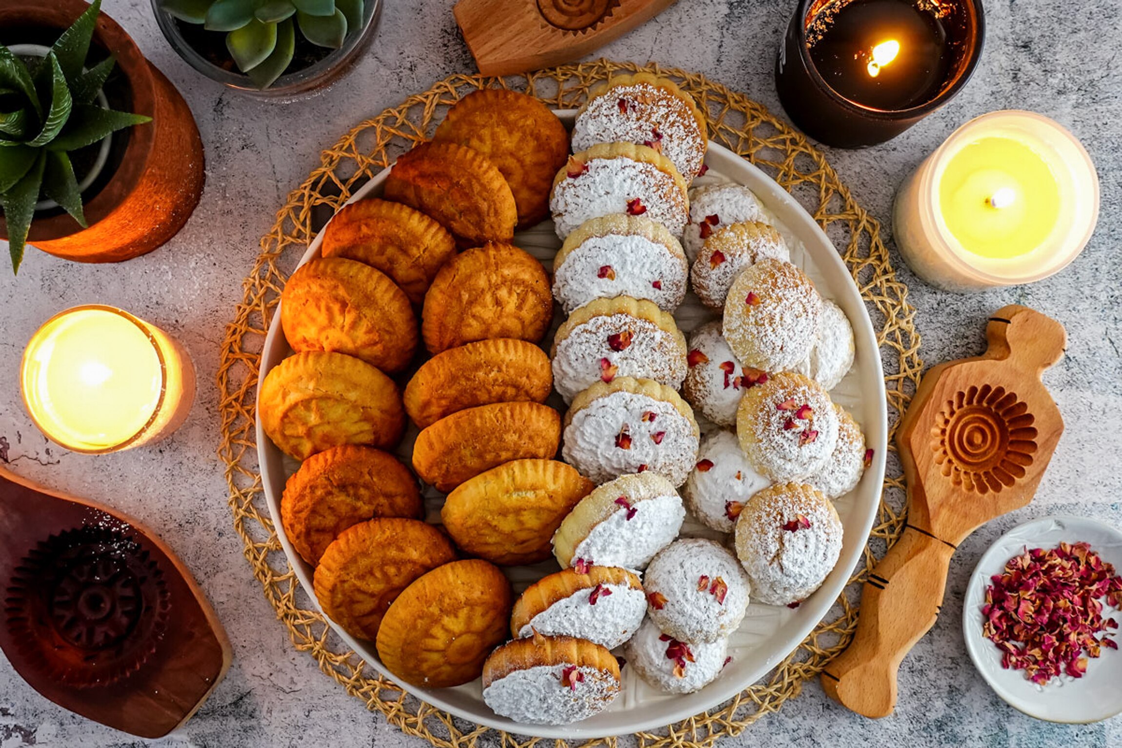 A plate of homemade mamoul cookies with date and nut fillings to celebrate Eid.