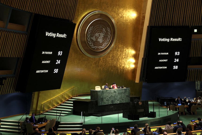 Displays show the results of voting on suspending Russia from United Nations Human Rights Council.