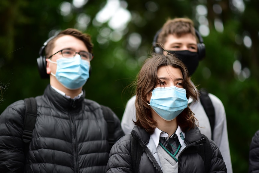 A group of students from Adelaide Botanic High School wearing face masks