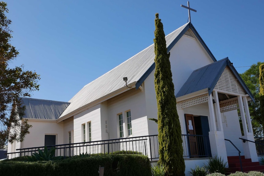 The exterior of a small white rural church in the WA Wheatbelt