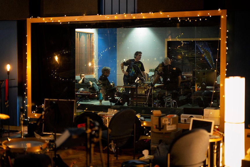 A look from the outside of Cold Chisel recording their album in studio