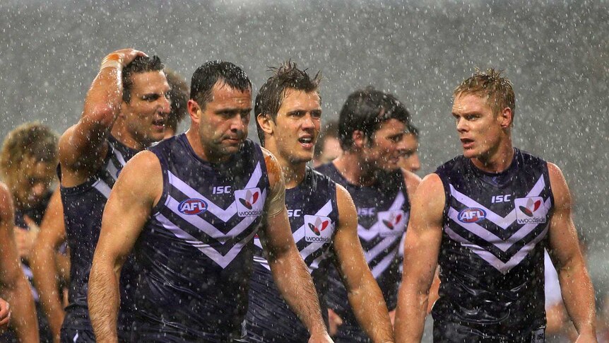 Dockers smashed in the rain
