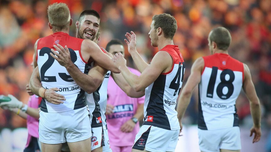 Demons celebrate shock win over Crows