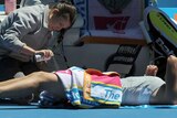 Upset loss...Wozniacki needed medical treatment midway through her class with Li.