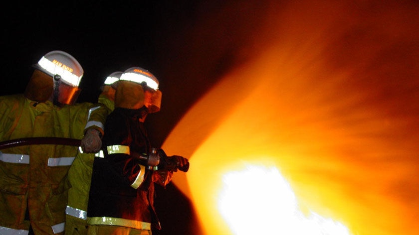 A candle and an electric fan are to blame for two house fires overnight in Mandurah and Yangebup