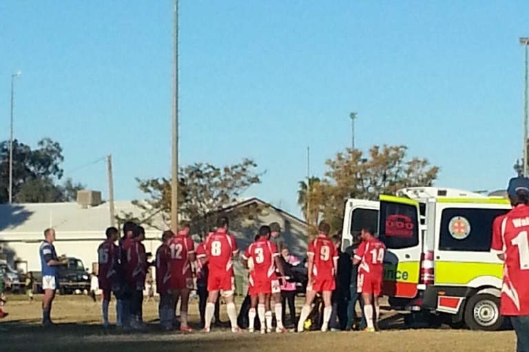 Ambulance takes Liam off the field at Rowdens Park in St George July 27, 2014.