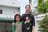 Vietnamese political prisoner Mother Mushroom with her young daughter.