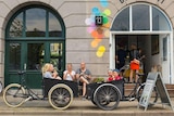 A family enjoys ice cream after cycling in Copenhagen.