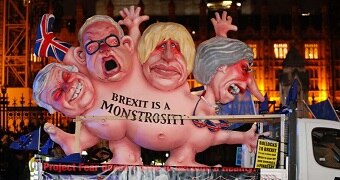 An anti-Brexit effigy is driven around Parliament square