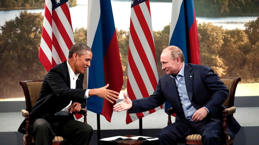 Barack Obama and Vladimir Putin meeting at the G8.