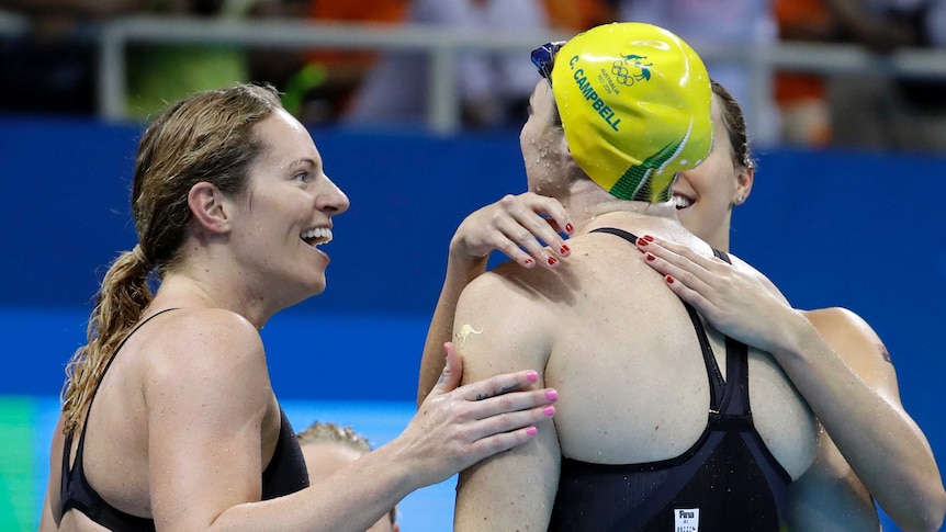 Australians celebrate their silver medal in the women's 4 x 100m medley relay