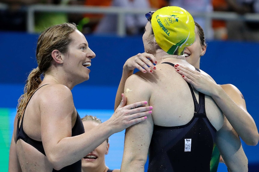 Australians celebrate their silver medal in the women's 4 x 100m medley relay