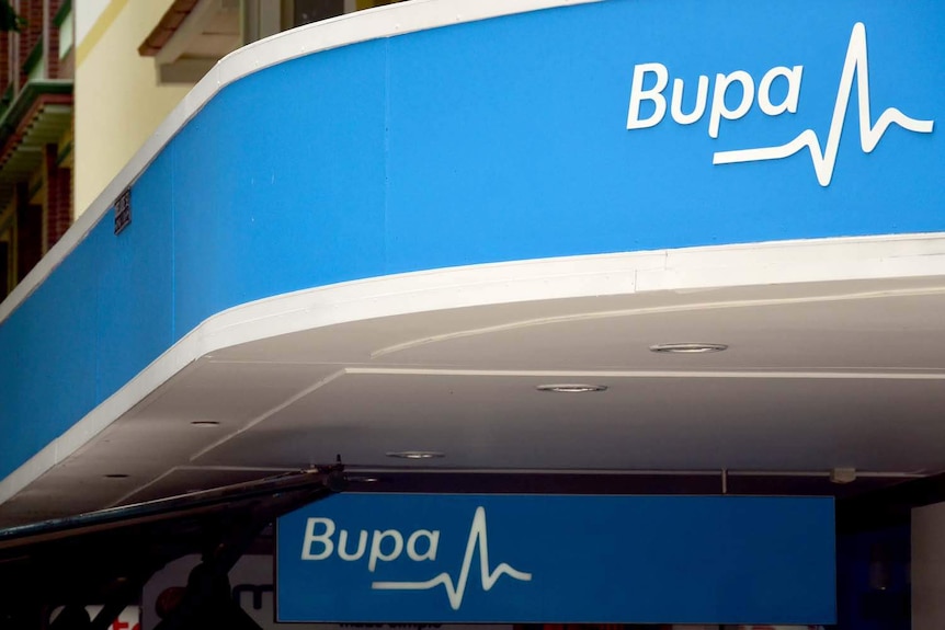 The facade of an office, which reads "Bupa".