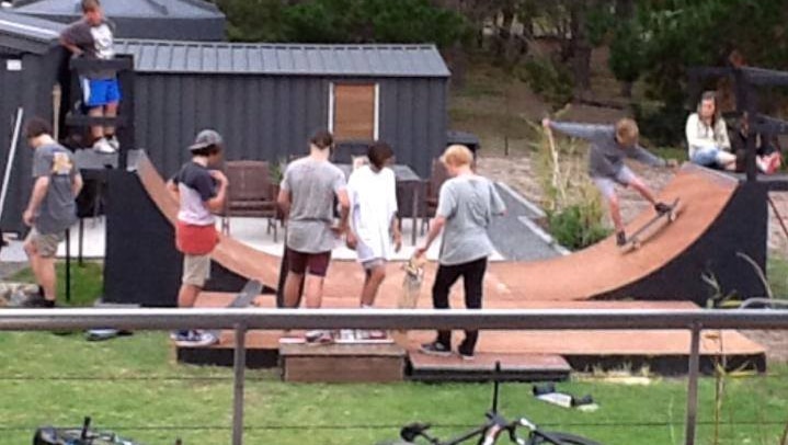 The backyard skate ramp in South Arm in full use from local teenagers.