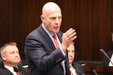 Tasmanian Treasurer Peter Gutwein has proposed a wage freeze to save 500 jobs.