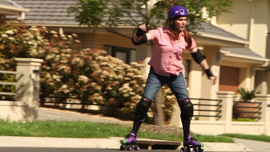 Evelyn Winter practices rollerskating near her home in Adelaide.
