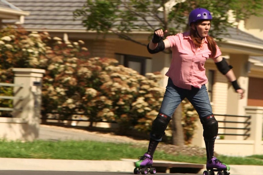 Evelyn Winter practices rollerskating near her home in Adelaide.