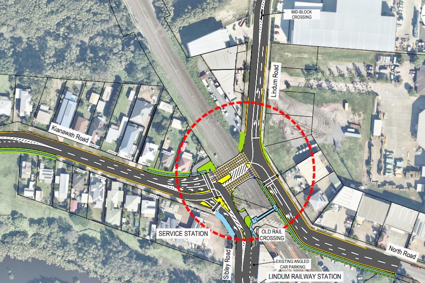 Map of a train station crossing and surrounding roads.