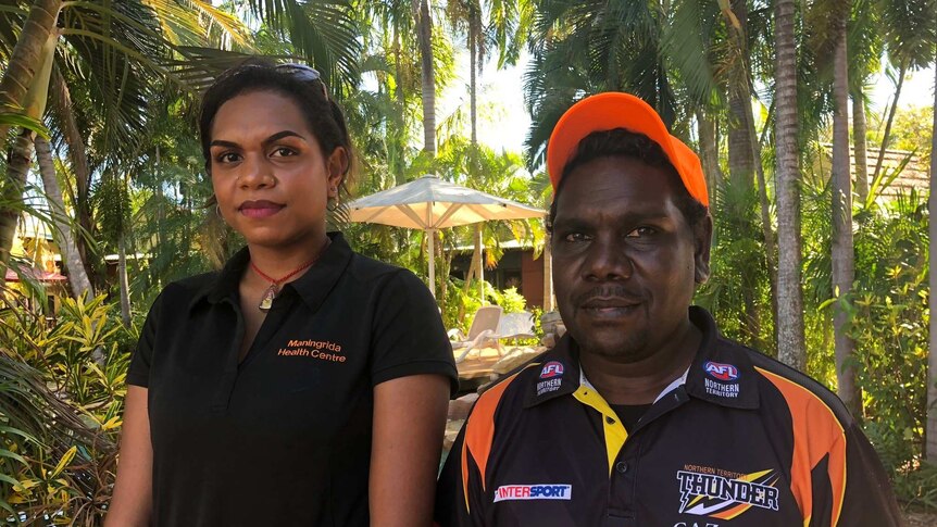 Two Arnhem land community health workers stand together.