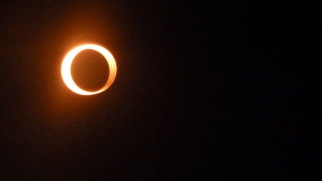 The moon covers the sun during an annular eclipse