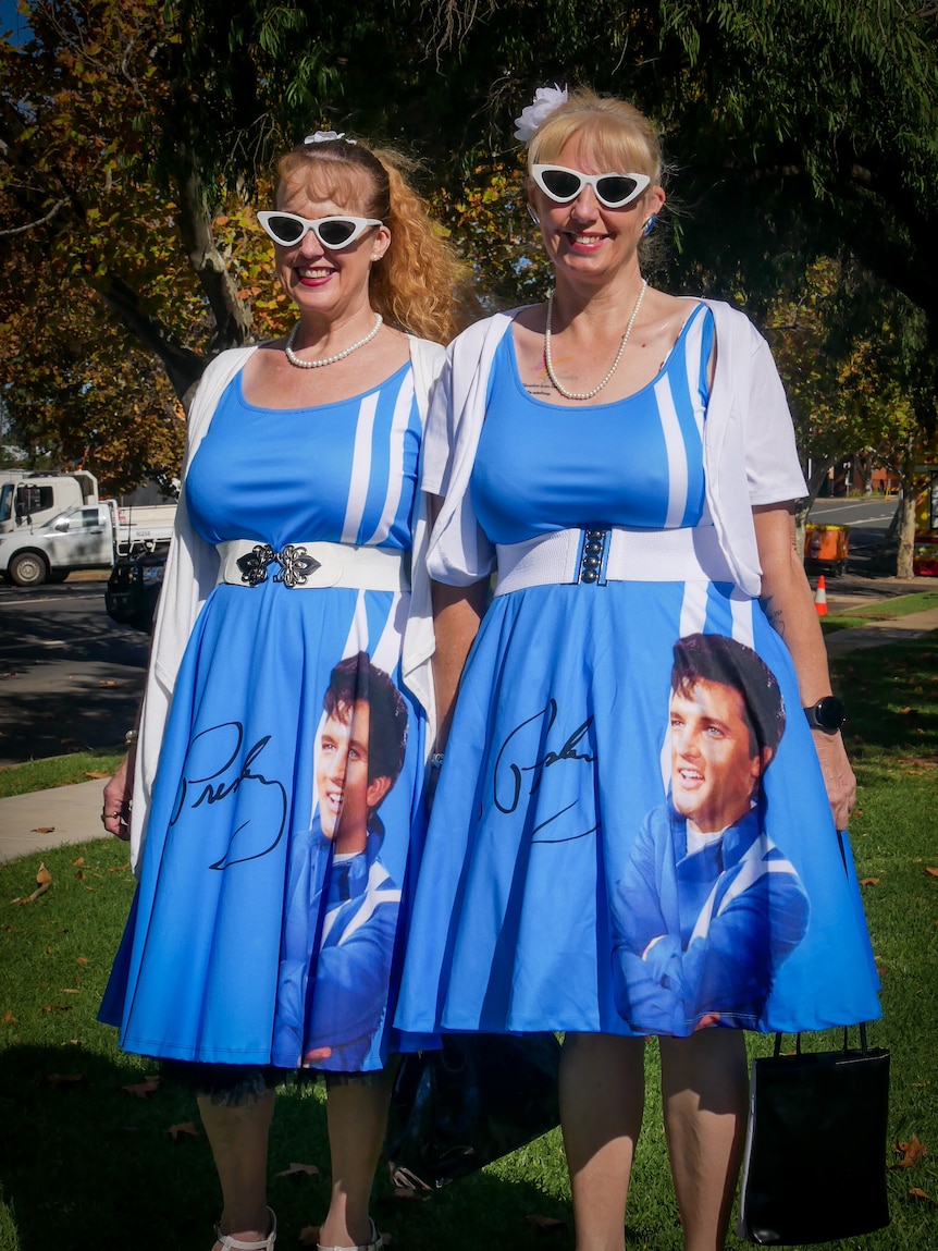 Two women in Elvis dresses.