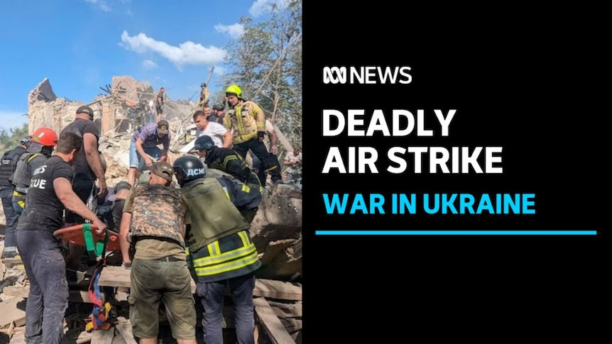 Deadly Air Strike, War in Ukraine: Emergency workers surrounding rubble. One holds a stretcher.