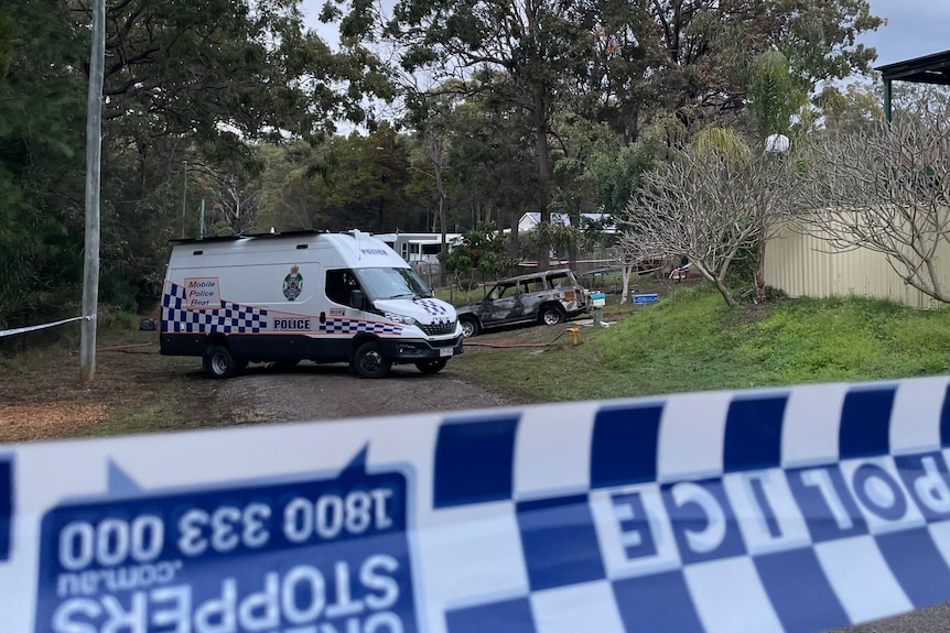 A police exclusion zone following a fatal house fire on Russell Island
