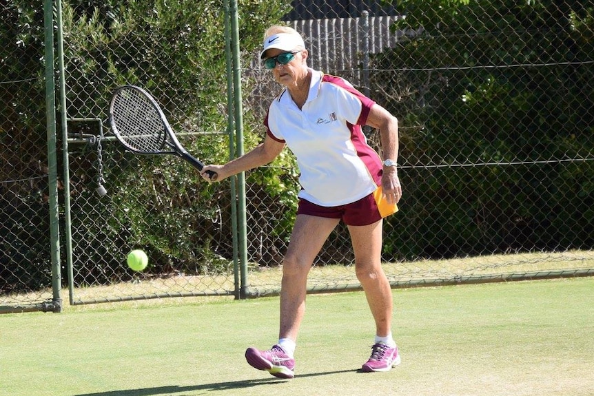 Nola Collins playing tennis in 2017