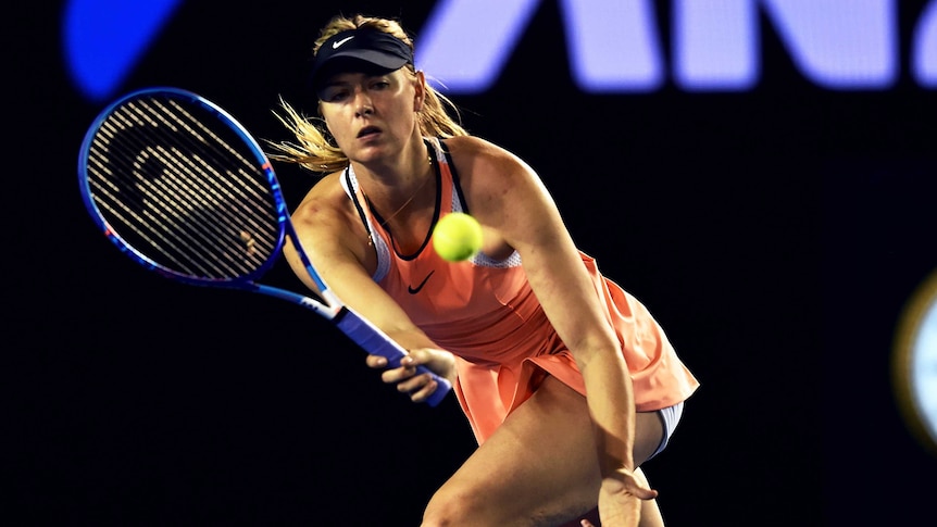 Sharapova plays a forehand against Davis