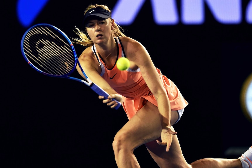 Sharapova plays a forehand against Davis