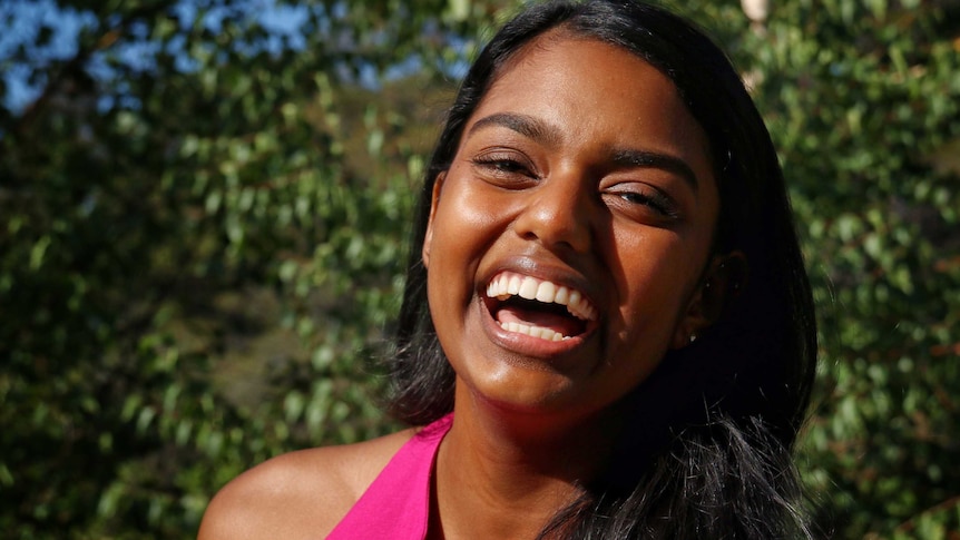 Close up of Veena Wijewickrema laughing.