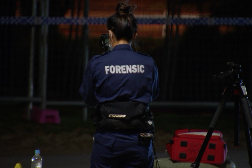A police forensics officer.