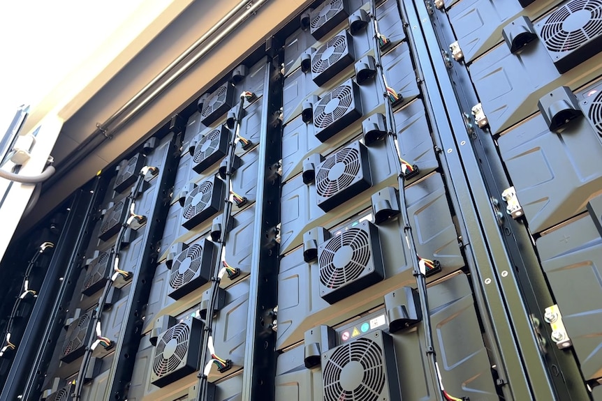 A towering black battery fitted with rows of cooling fans.