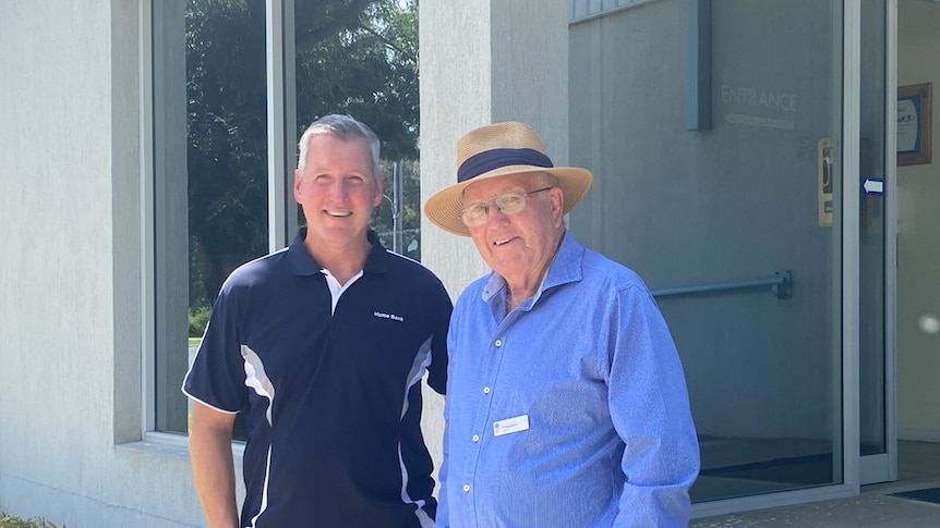 Hume Bank CEO Stephen Capello and Greater Hume Shire Mayor Tony Quinn smile in front of Holbrook's council building