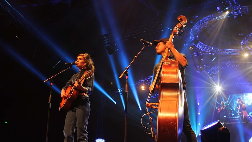 Fanny Lumsden plays guitar and sings alongside cellist