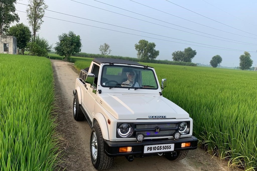 Hardeep Mander's father in a car in Punjab India.