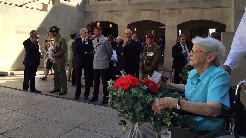 Relative of Harry Bowser lays a wreath at AWM