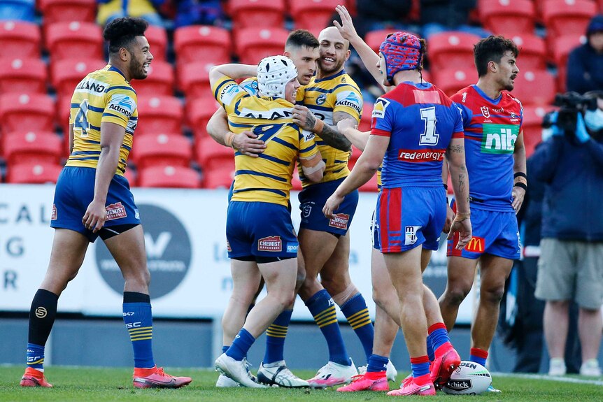 The Eels celebrate a Ryan Matterson try