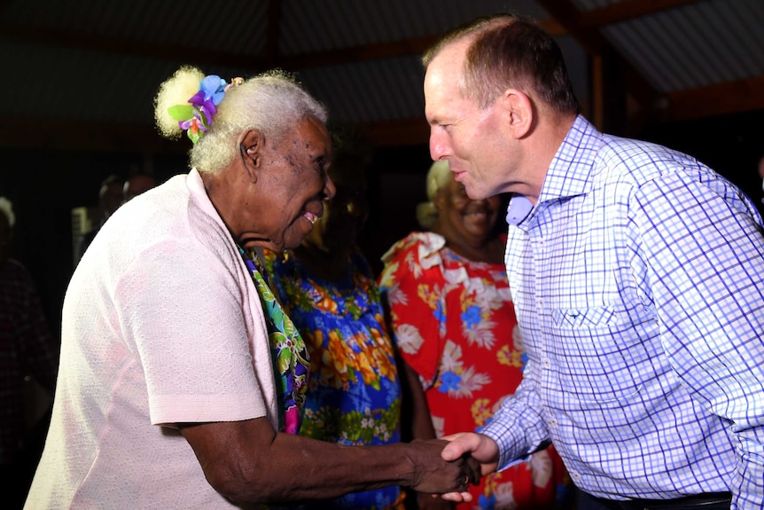 Tony Abbott gretting Kaurareg elder on Horn Island