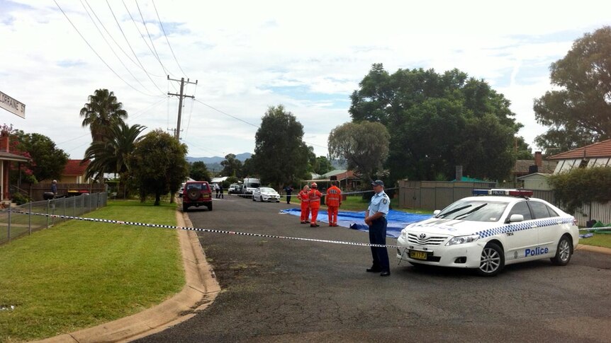 NSW Police at the scene outside of a block of flats at Coledale in Tamworth.