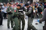 Bomb squad officials inspect Bangkok blast site
