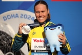Chelsea Gubecka with her silver medal at the World Aquatics Championships.