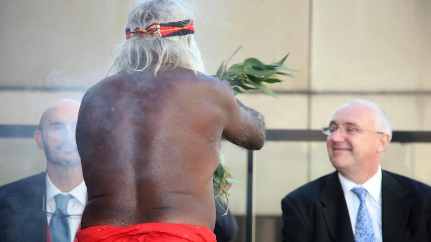 Uncle Max Eulo from the Buddgeti Tribe performs a smoking ceremony