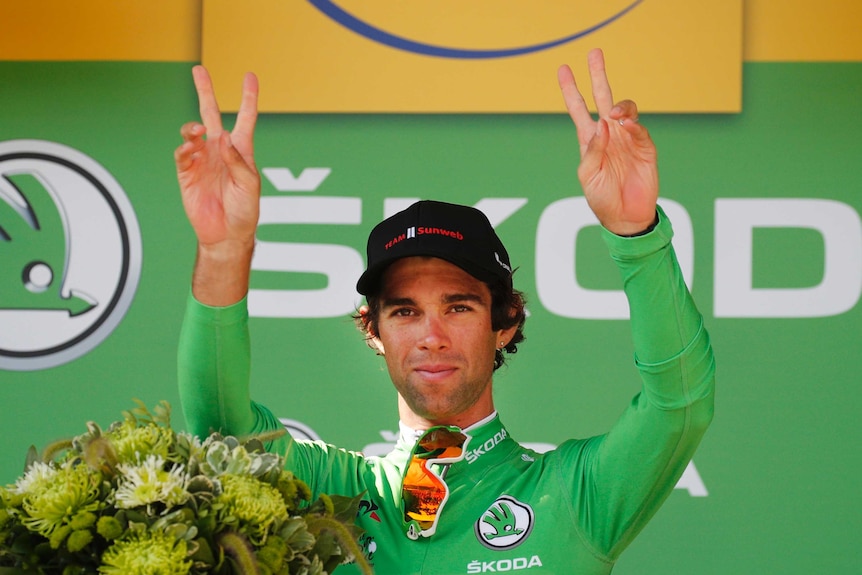 Michael Matthews celebrates in Tour de France green jersey