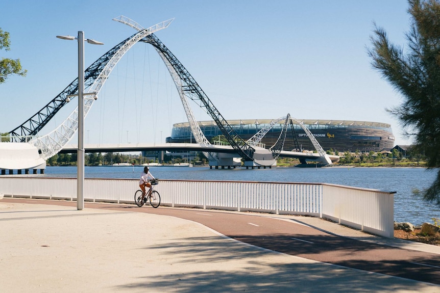 Lone cyclist near Optus Stadium