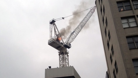 Crane on fire on a building site in Ultimo