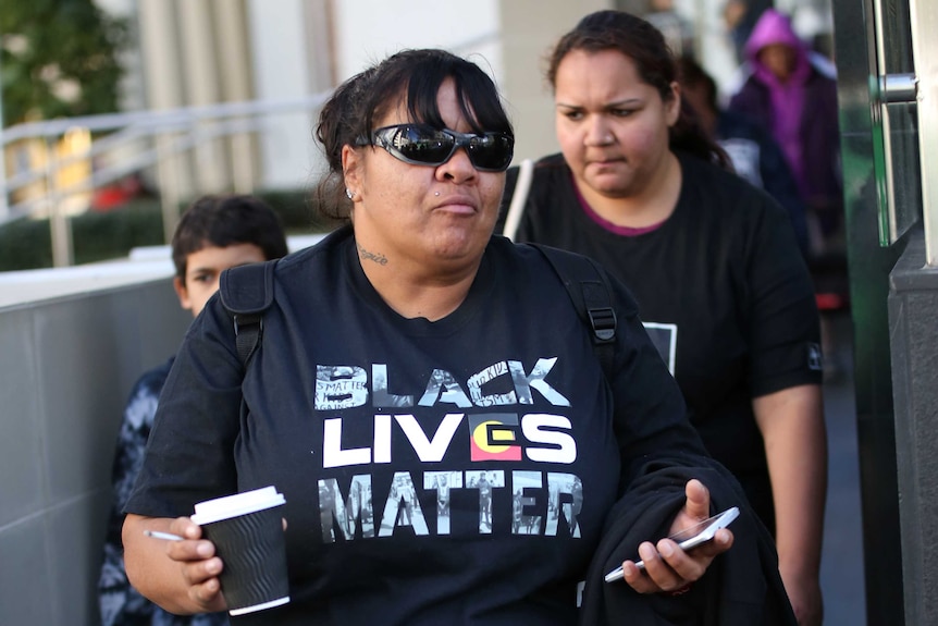 Elijah Doughty's mother Petrina Annette James leaves court wearing a Black Lives Matter t-shirt.