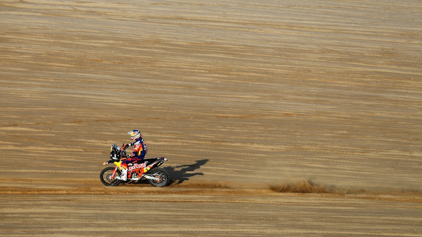 Motorcyclist in desert