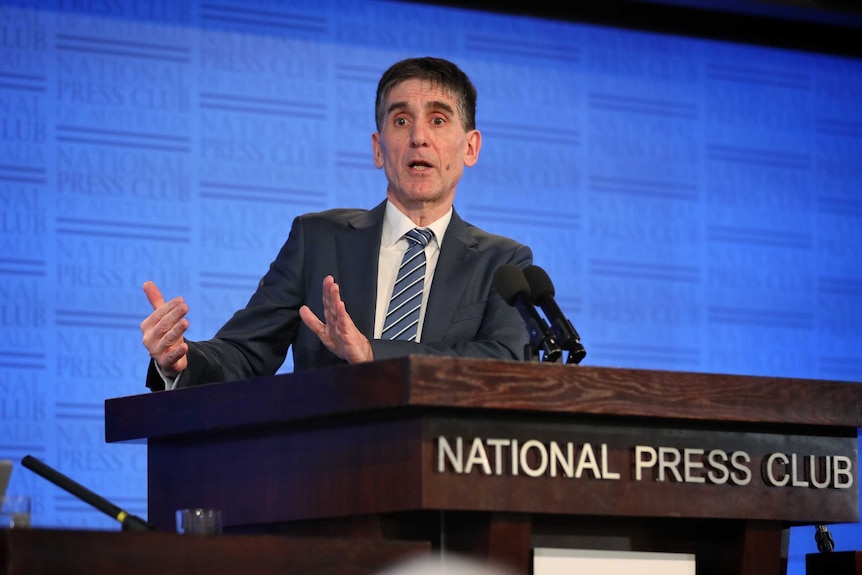 Tony Bartone speaks at a National Press Club lectern